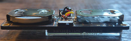 Makeshift piezo driver circuit on back of board